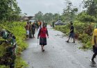 Satgas Yonif 1 Marinir dan Warga Logpon Gotong Royong Bersihkan Jalan Perbatasan